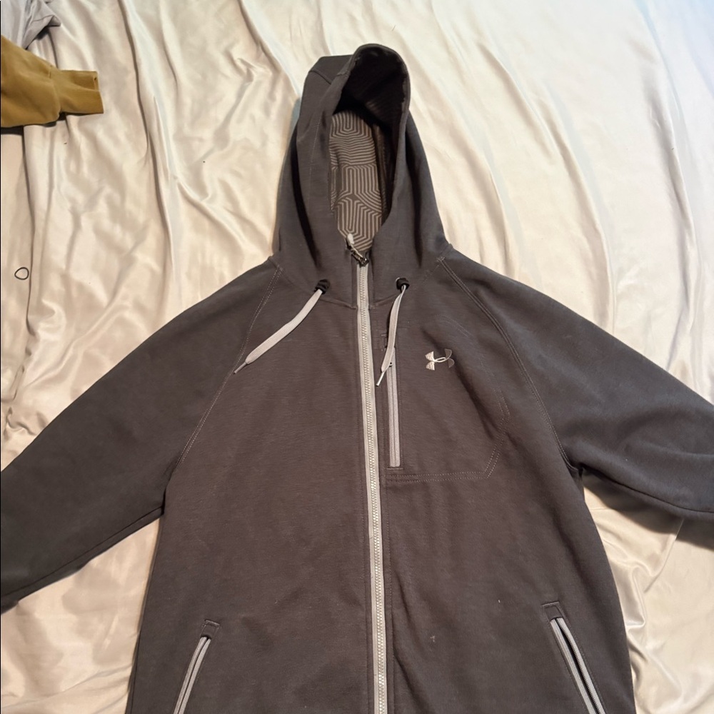 Under armour rain jacket with infrared warming tech.